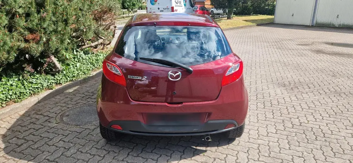 Gebraucht Mazda 2 75 PS (55 kW) 2012 Rot Kleinwagen