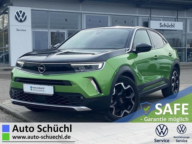 Grün Gebraucht 2021 Opel Mokka-e Ultimate SUV | 16.470 € (Fairer Preis) - Bild 1/4