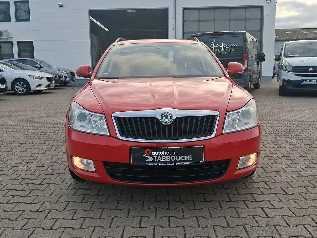Gebraucht Skoda Octavia Ambition 105 PS (77 kW) 2013 Rot Kombi