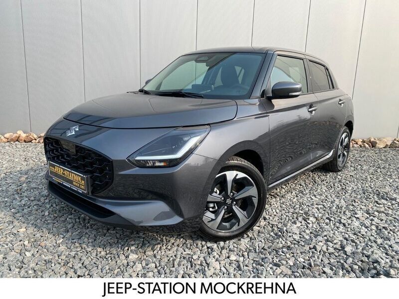 Grau Neu 2024 Suzuki Swift Comfort+ Limousine | 19.900 € - Bild 1/4