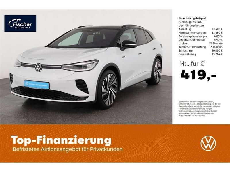 Gletscherweiß metallic/ dach s Gebraucht 2024 VW ID.4 GTX SUV | 44.940 € (Superpreis) - Bild 1/3