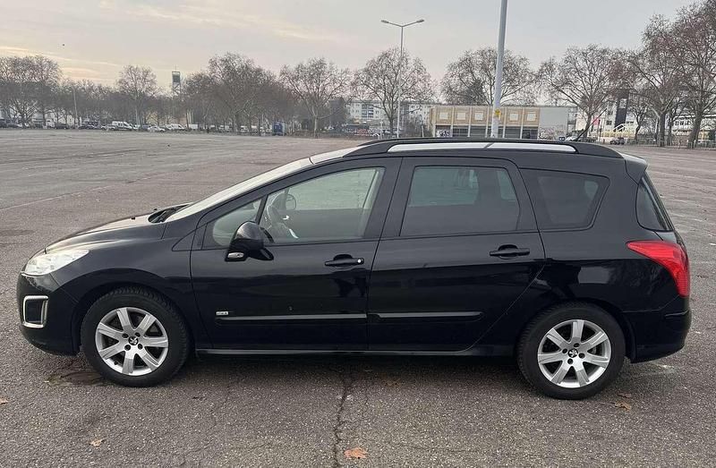 Schwarz Gebraucht 2013 Peugeot 308 Active Kombi | 5.300 € (Superpreis) - Bild 1/4