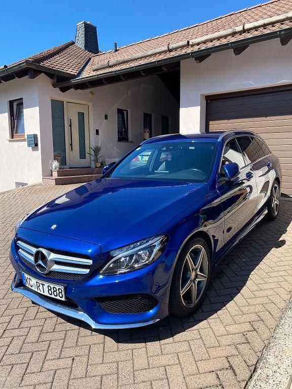 Blau Gebraucht 2015 Mercedes C220 AMG line Limousine | 14.900 € (Fairer Preis) - Bild 1/4