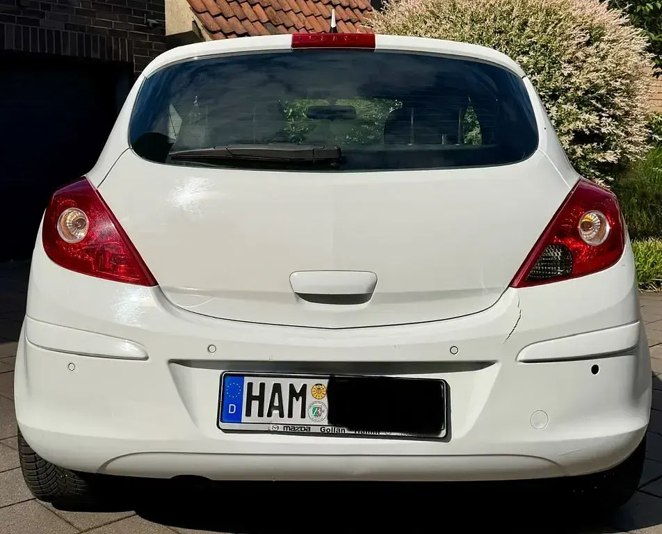 Gebraucht Opel Corsa Active 69 PS (50 kW) 2013 Weiß Kleinwagen