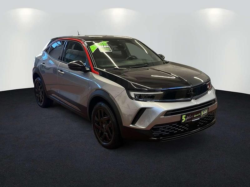 Gebraucht Opel Mokka GS Line 131 PS (96 kW) 2023 Kontrast grau/quarz silber SUV