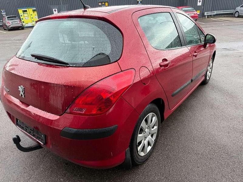 Gebraucht Peugeot 308 Tendance 95 PS (69 kW) 2008 Farbe rot babylone/metalllack Kleinwagen