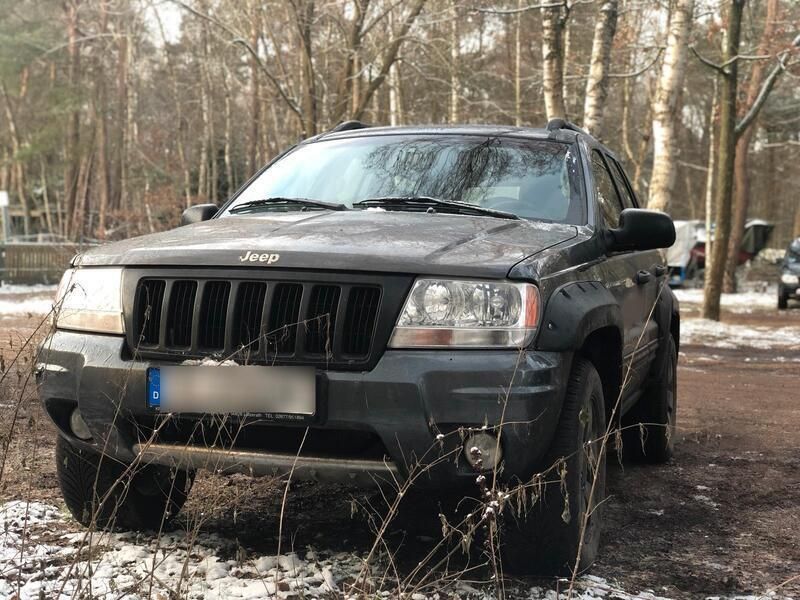 Grau Gebraucht 2003 Jeep Grand Cherokee SUV | 3.999 € - Bild 1/4