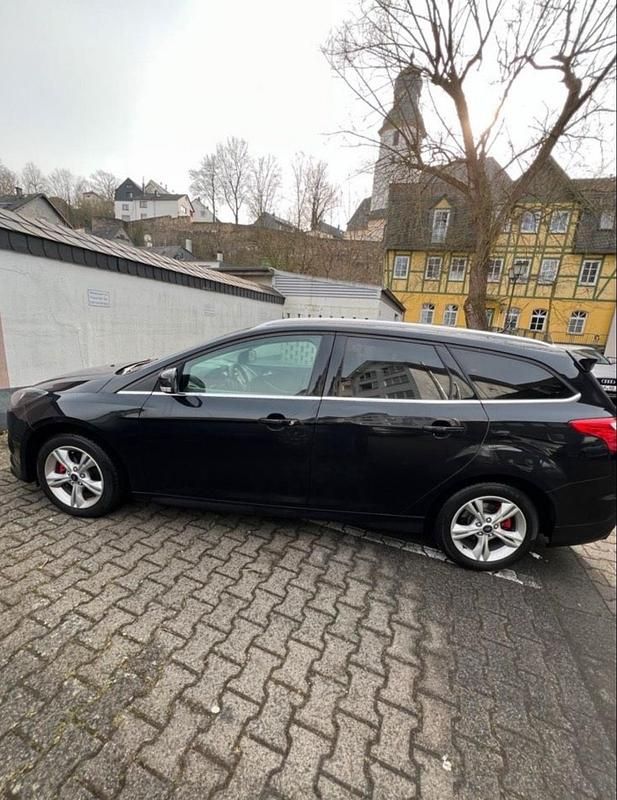 Gebraucht Ford Focus Titanium 115 PS (84 kW) 2014 Schwarz Kombi