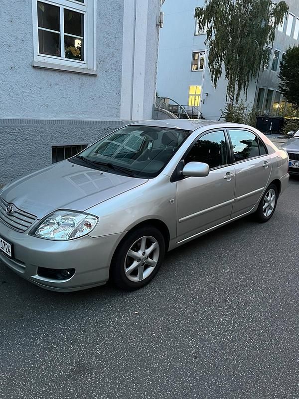 Grau Gebraucht 2006 Toyota Corolla Limousine | 4.800 € (Fairer Preis) - Bild 1/4