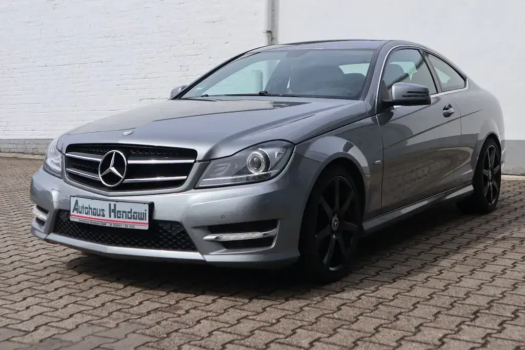 Gebraucht Mercedes C180 AMG 156 PS (114 kW) 2012 Silber Coupé