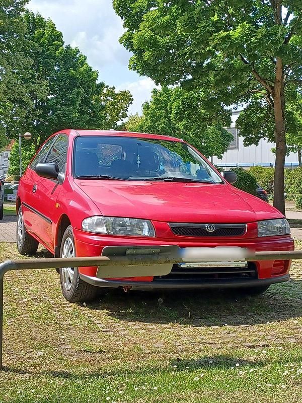 Rot Gebraucht 1997 Mazda 323 Kleinwagen | 1.300 € - Bild 1/4