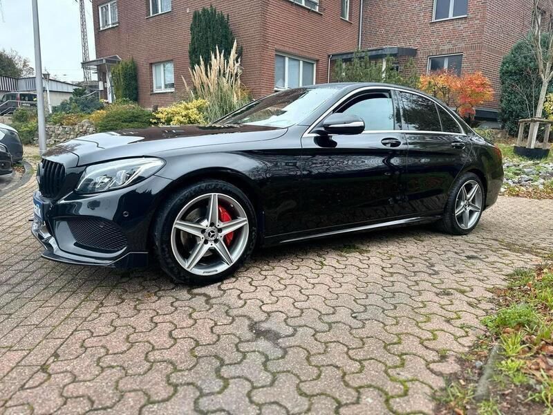 Schwarz Gebraucht 2014 Mercedes C200 AMG line Limousine | 17.000 € - Bild 1/4