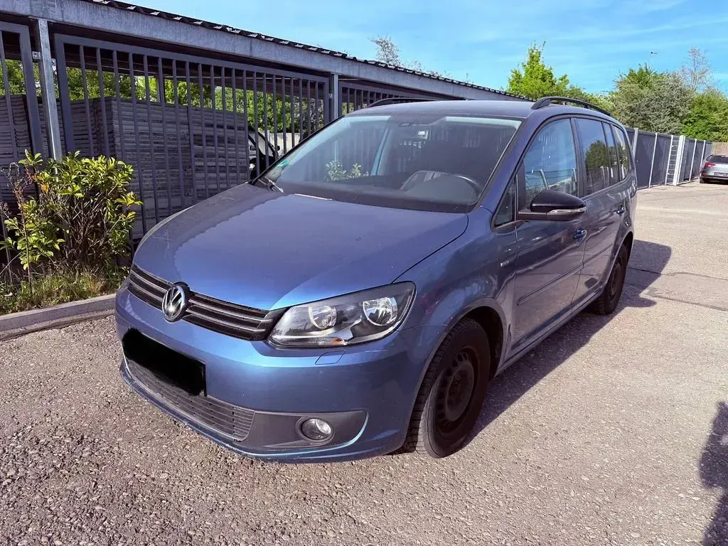 Używany VW Touran Match 105 KM (77 kW) 2012 Szary Minivan
