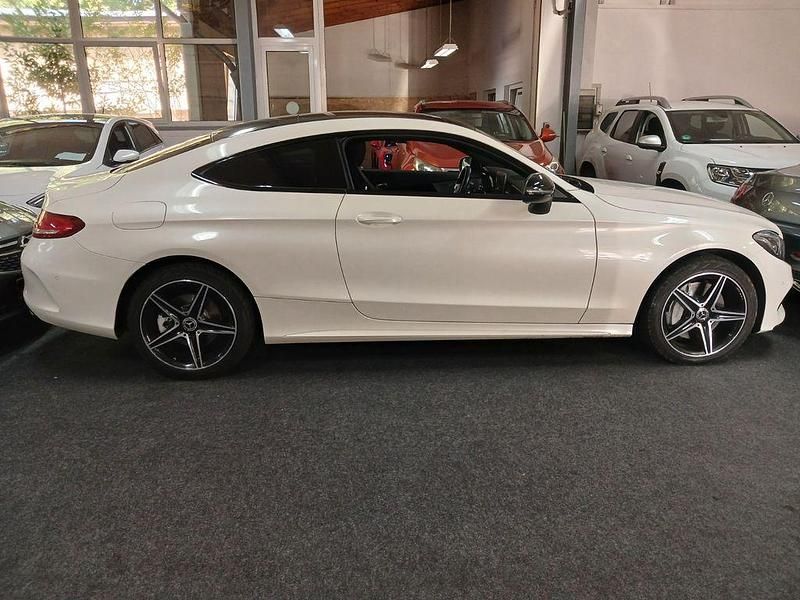 Gebraucht Mercedes C400 AMG line 333 PS (244 kW) 2018 Diamantweiss Coupé