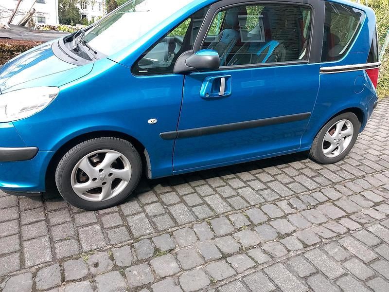 Blau Gebraucht 2006 Peugeot 1007 Kleinwagen | 2.100 € (Fairer Preis) - Bild 1/4