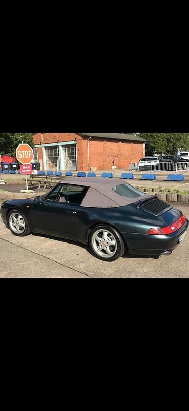 Grün Gebraucht 1995 Porsche 911 Carrera Cabriolet Cabrio | 87.500 € - Bild 1/4