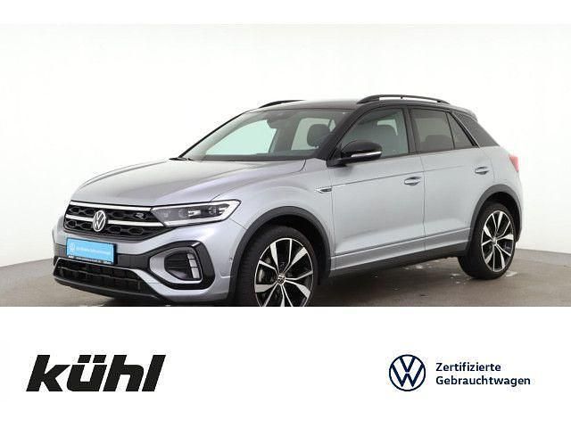 Pyrit silber metallic / schwar Gebraucht 2024 VW T-Roc R-line SUV | 29.980 € (Fairer Preis) - Bild 1/4