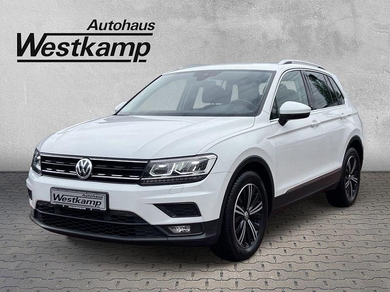 Pure white Gebraucht 2018 VW Tiguan Sound SUV | 19.630 € (Fairer Preis) - Bild 1/4