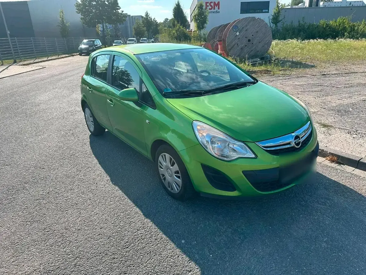 Gebraucht Opel Corsa 87 PS (63 kW) 2012 Grün Kleinwagen