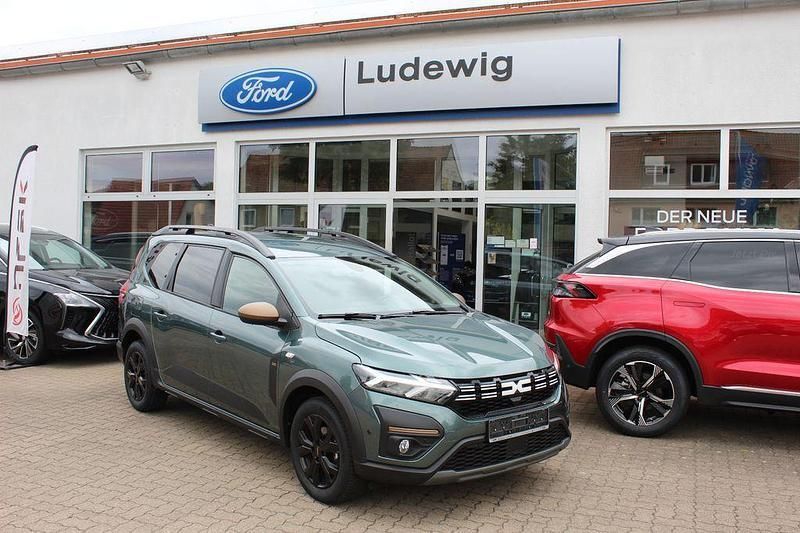 Grün Gebraucht 2024 Dacia Jogger Extreme Limousine | 21.490 € (Etwas zu teuer) - Bild 1/4
