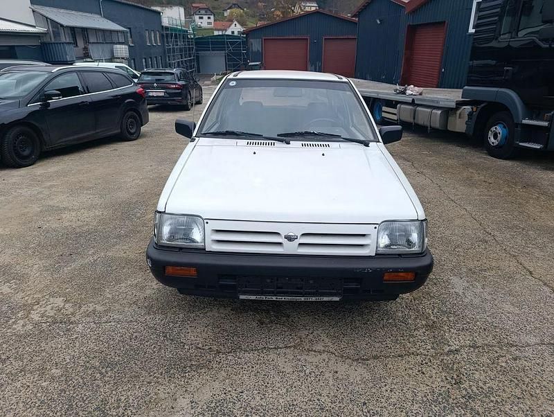 Weiß Gebraucht 1992 Nissan Micra Kleinwagen | 599 € - Bild 1/4