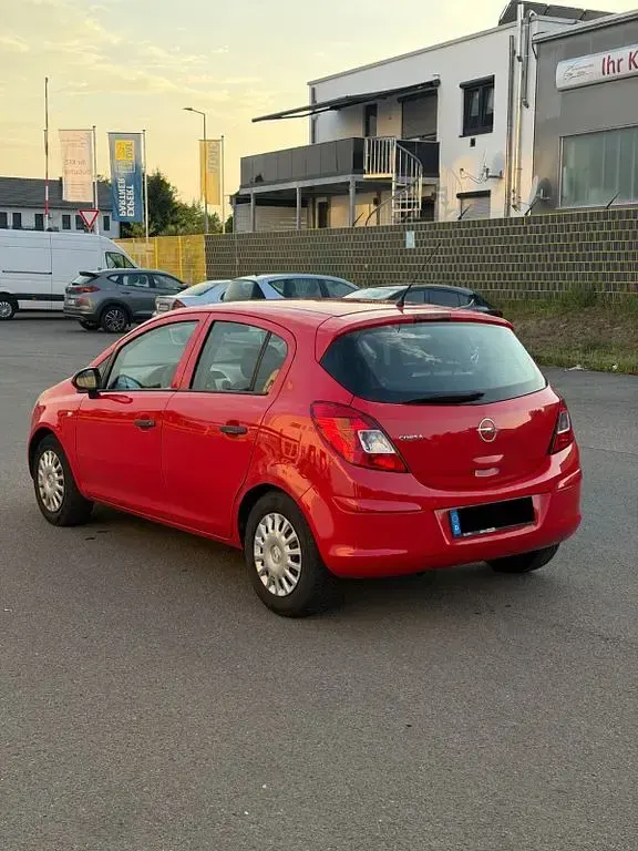 Gebraucht Opel Corsa Edition 80 PS (58 kW) 2009 Rot Kleinwagen