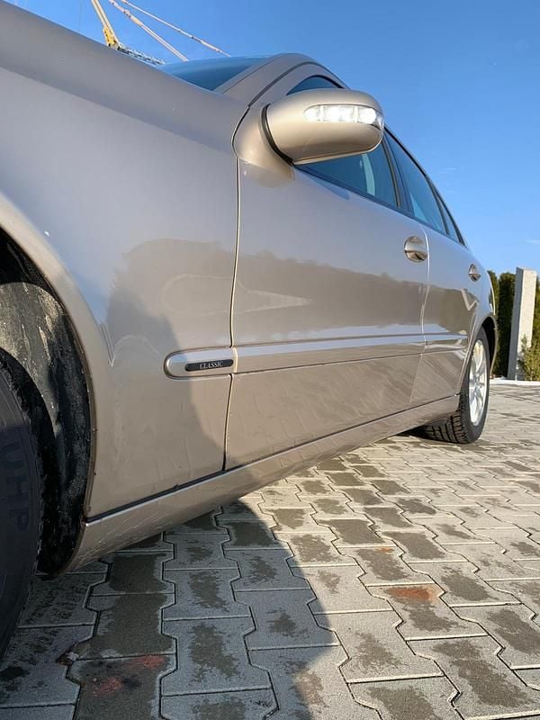 Second-hand Mercedes E200 163 CP (119 kW) 2003 Auriu Berlinǎ