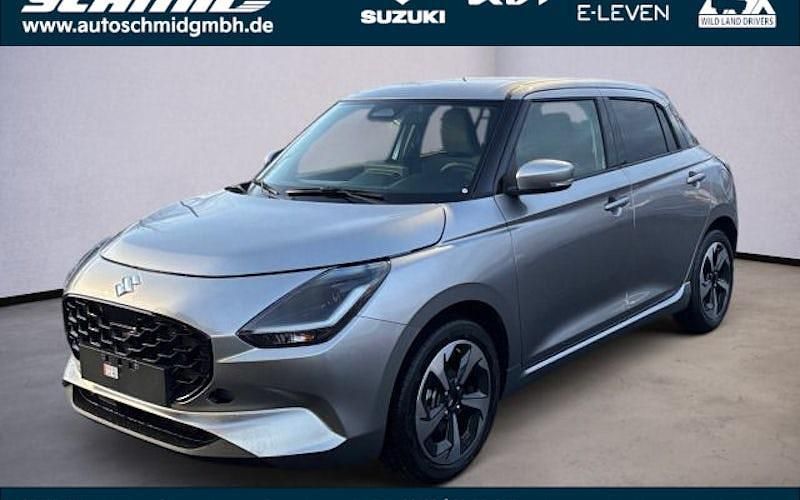 Cool yellow metallic Neu 2025 Suzuki Swift Comfort Kleinwagen | 21.990 € - Bild 1/4