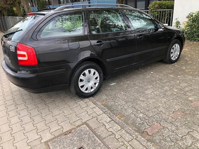 Second-hand Skoda Octavia 160 CP (117 kW) 2010 Negru Break