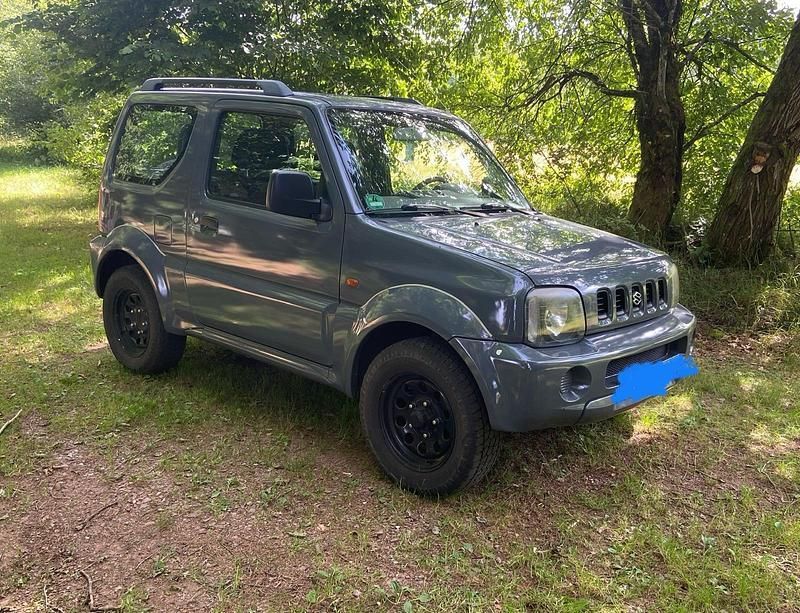 Grau Gebraucht 1999 Suzuki Jimny SUV | 7.700 € - Bild 1/4