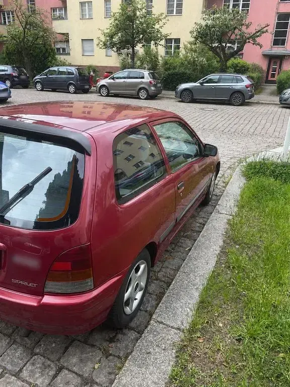 Gebraucht Toyota Starlet 75 PS (55 kW) 1997 Rot Kleinwagen