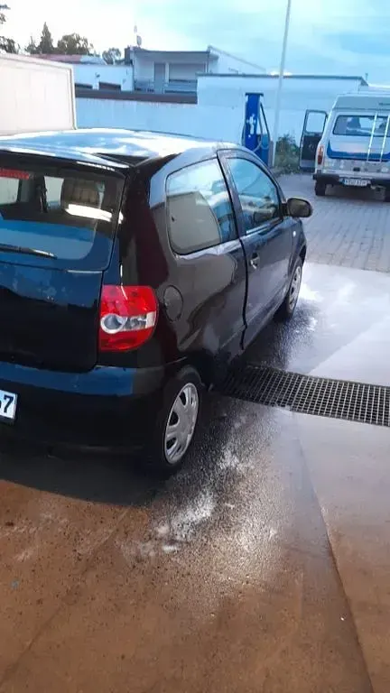 Gebraucht VW Fox 54 PS (39 kW) 2005 Schwarz Kleinwagen
