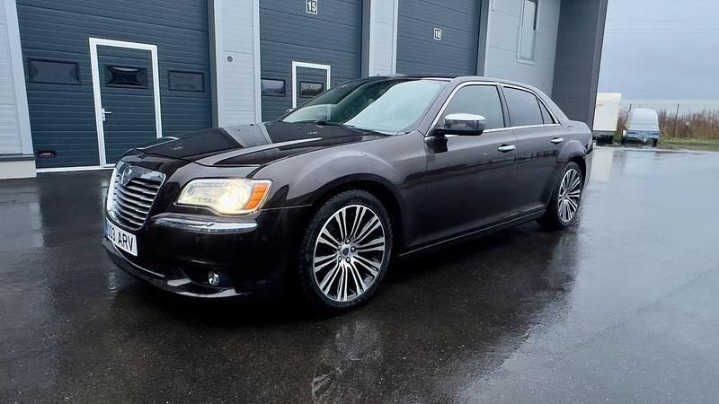 Braun Gebraucht 2011 Lancia Thema Platinum Limousine | 7.900 € - Bild 1/4