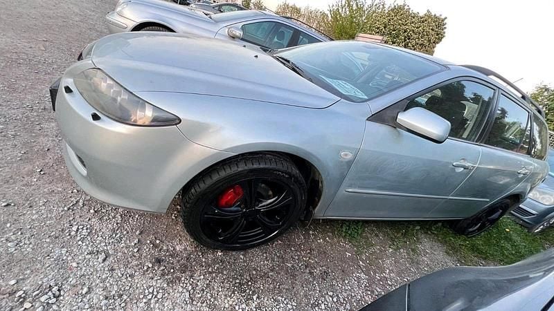 Silber Gebraucht 2007 Mazda 2 Kombi | 1.999 € - Bild 1/4