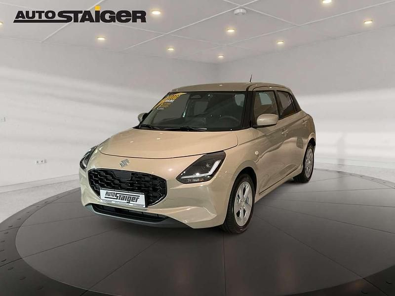 Caravan ivory Neu 2025 Suzuki Swift Comfort Kleinwagen | 16.990 € - Bild 1/4