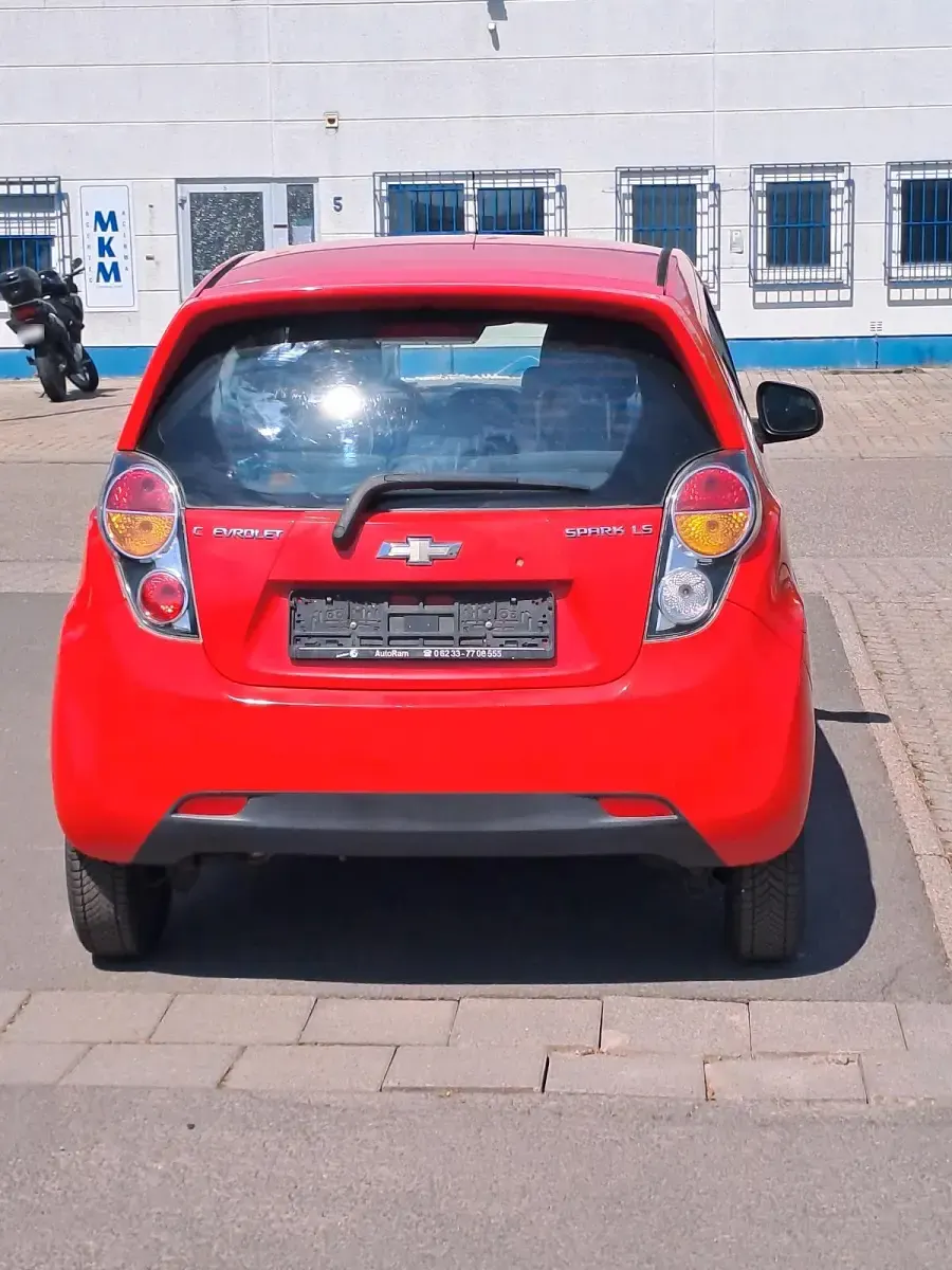 Second-hand Chevrolet Spark LS 68 CP (50 kW) 2011 Roșu Hatchback