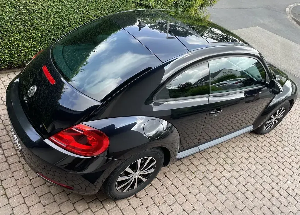 Gebraucht VW Beetle 105 PS (77 kW) 2012 Schwarz Kleinwagen