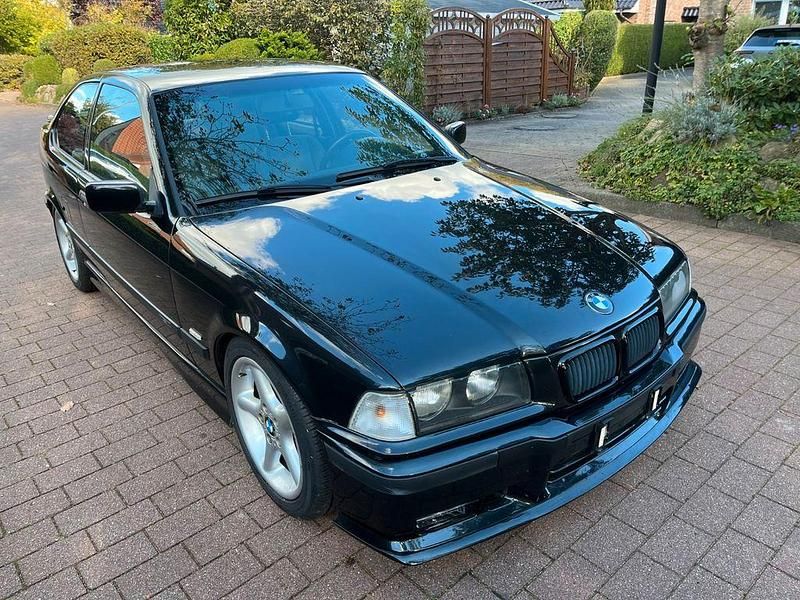 Schwarz Gebraucht 1997 BMW 323 Compact Sport Line Kleinwagen | 6.950 € (Fairer Preis) - Bild 1/4