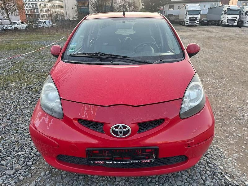 Gebraucht Toyota Aygo Cool 68 PS (50 kW) 2006 Rot Kleinwagen