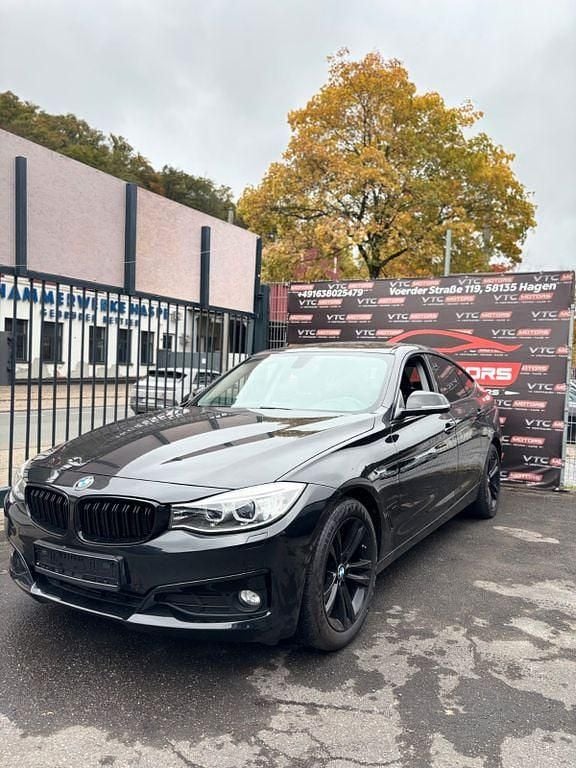Schwarz Gebraucht 2014 BMW 318 Gran Turismo Comfort Edition Limousine | 12.300 € (Fairer Preis) - Bild 1/4