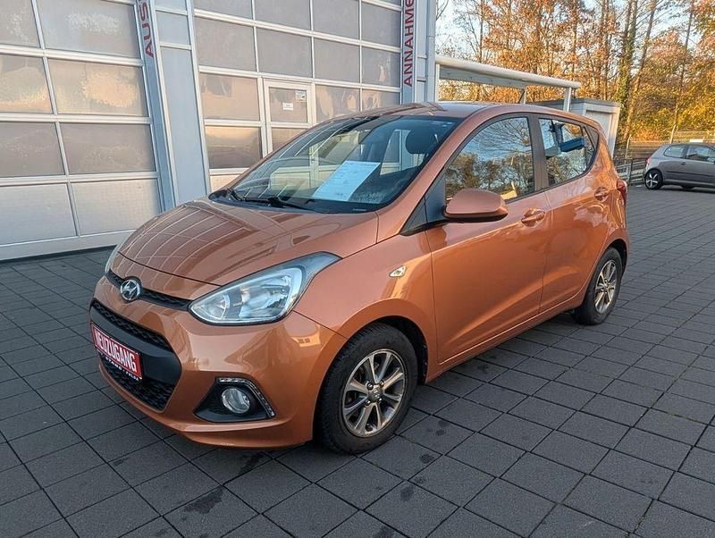 Orange Gebraucht 2014 Hyundai i10 Edition Kleinwagen | 7.990 € (Fairer Preis) - Bild 1/4