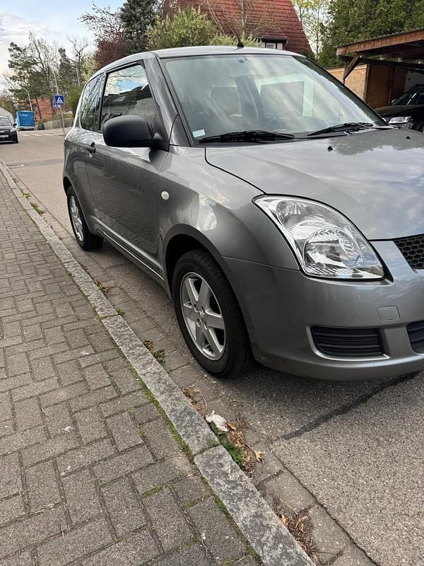 Second-hand Suzuki Swift 92 CP (67 kW) 2009 Gri Hatchback