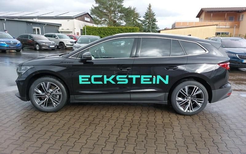 Schwarzmagic perleffekt Gebraucht 2024 Skoda Enyaq iV Suite SUV | 52.770 € - Bild 1/4