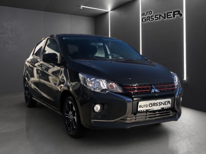 Grau Gebraucht 2024 Mitsubishi Space Star Select+ Limousine | 16.490 € (Teuer) - Bild 1/4
