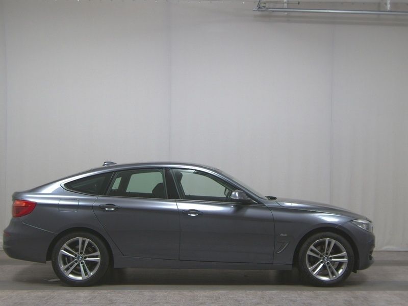 Grau Gebraucht 2018 BMW 320 Gran Turismo Sport Line Limousine | 16.490 € (Fairer Preis) - Bild 1/4