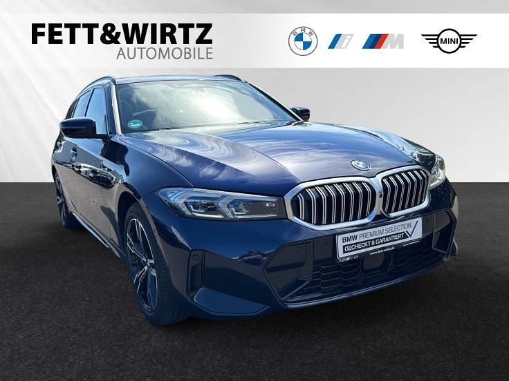 Bmw individual tansanitblau metallic Gebraucht 2024 BMW 330e M Sport Kombi | 49.800 € (Teuer) - Bild 1/3