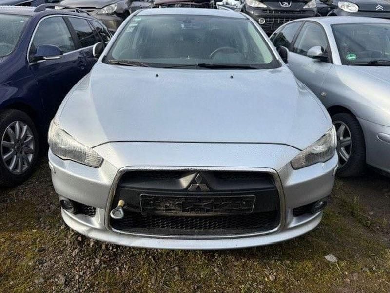 Gebraucht Mitsubishi Lancer 117 PS (86 kW) 2011 Cool silver (metallic) Limousine