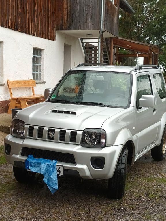 Silber Gebraucht 2015 Suzuki Jimny Comfort SUV | 13.700 € (Fairer Preis) - Bild 1/4