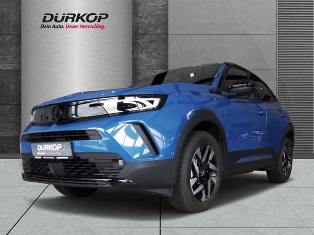 Lackierung voltaic blue met/ty Gebraucht 2023 Opel Mokka-e GS Line SUV | 21.990 € (Guter Preis) - Bild 1/4