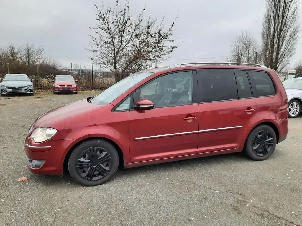 Gebraucht VW Touran Highline 170 PS (125 kW) 2010 Rot metallic Van / Kleinbus